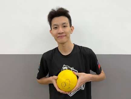 Team member with FUEL ball